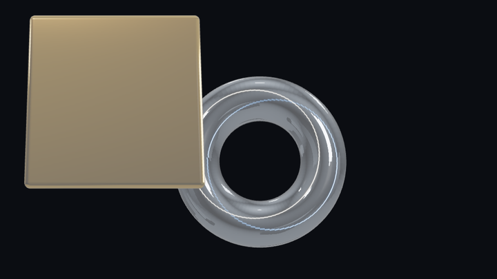 A gold cube and a chrome ring, three-dimensional, on a dark ground — one frame taken out of a finished export